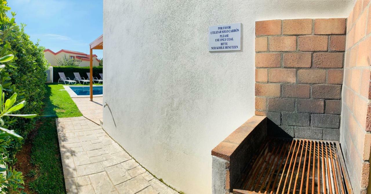 Villa Lauvic Cala 'n Bosch Buitenkant foto